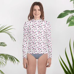 pink and black dots pattern youth rash guard