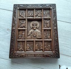 Carved icon of Nicholas the Wonderworker with scenes from his life Handmade