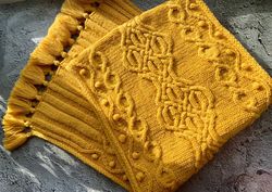 Handmade mustard scarf with beautiful pattern and tassels knitted from merino